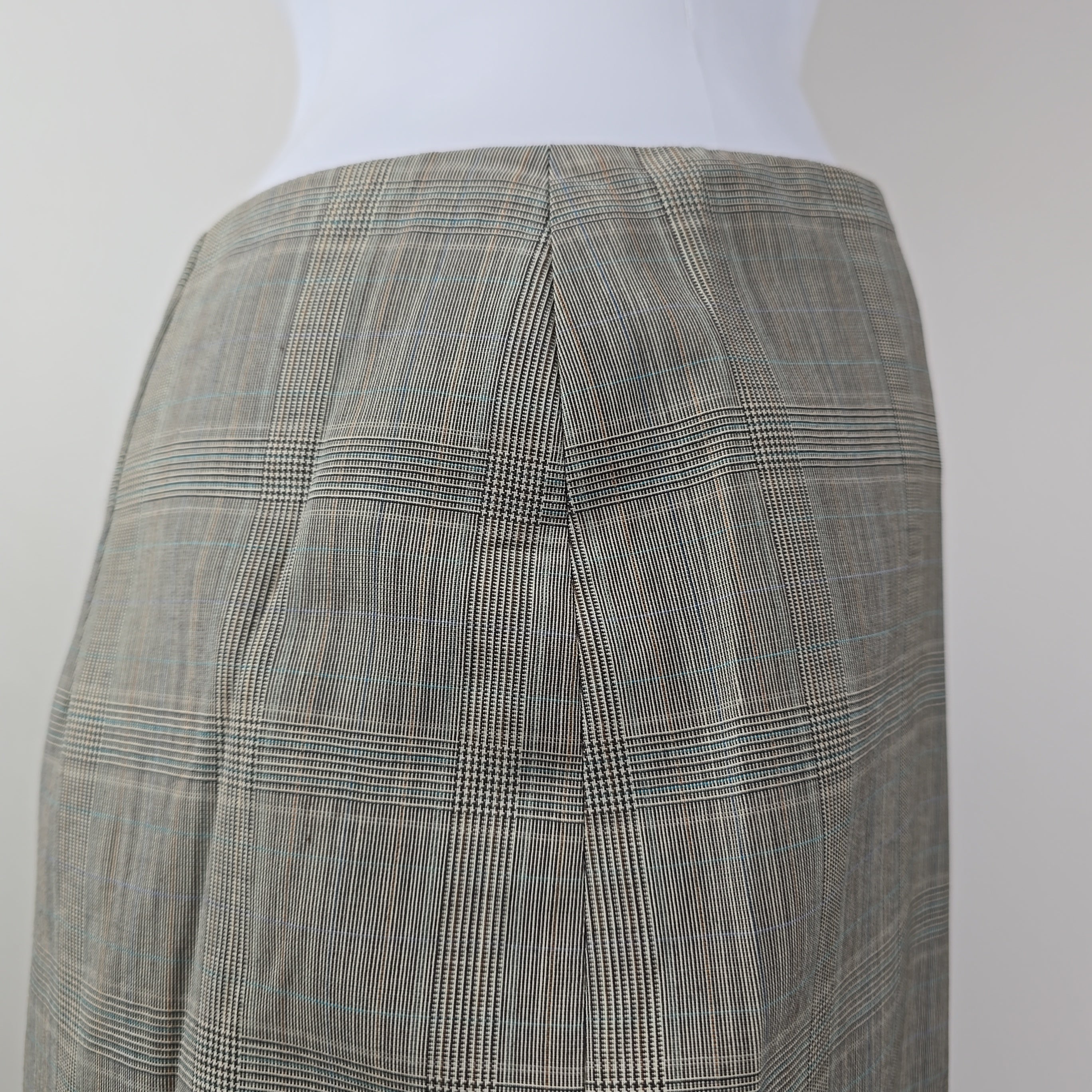 Gray checkered skirt on a white background