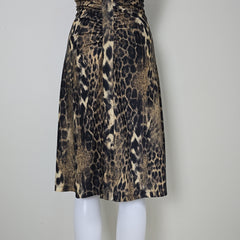 Leopard print fabric on a mannequin against a white background