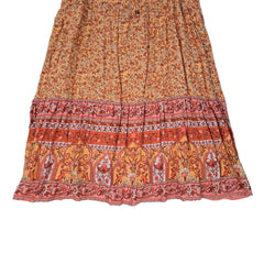 Orange patterned dress on a light background