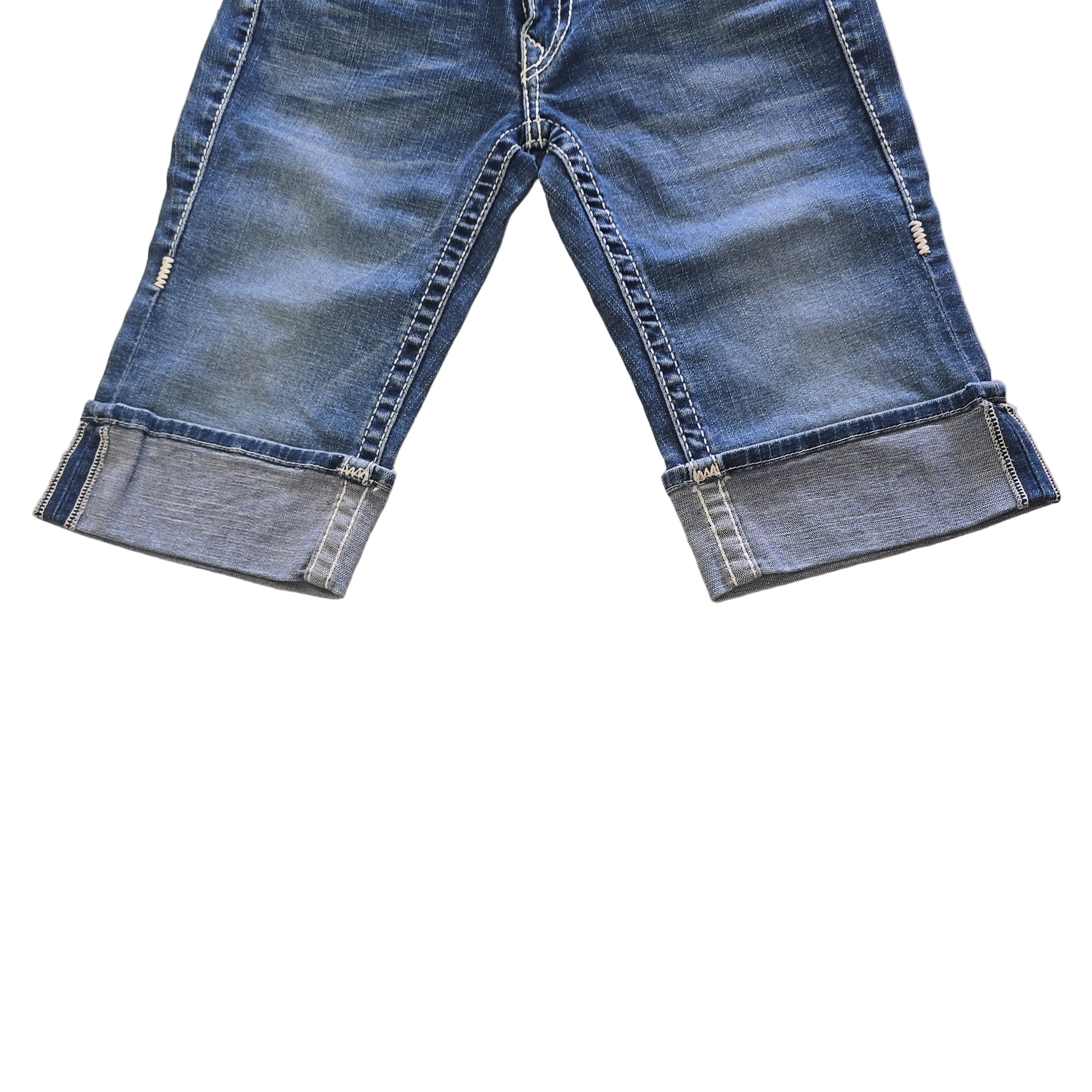 Pair of blue jean shorts on a light background