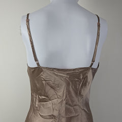 Brown dress on a mannequin with a plain background