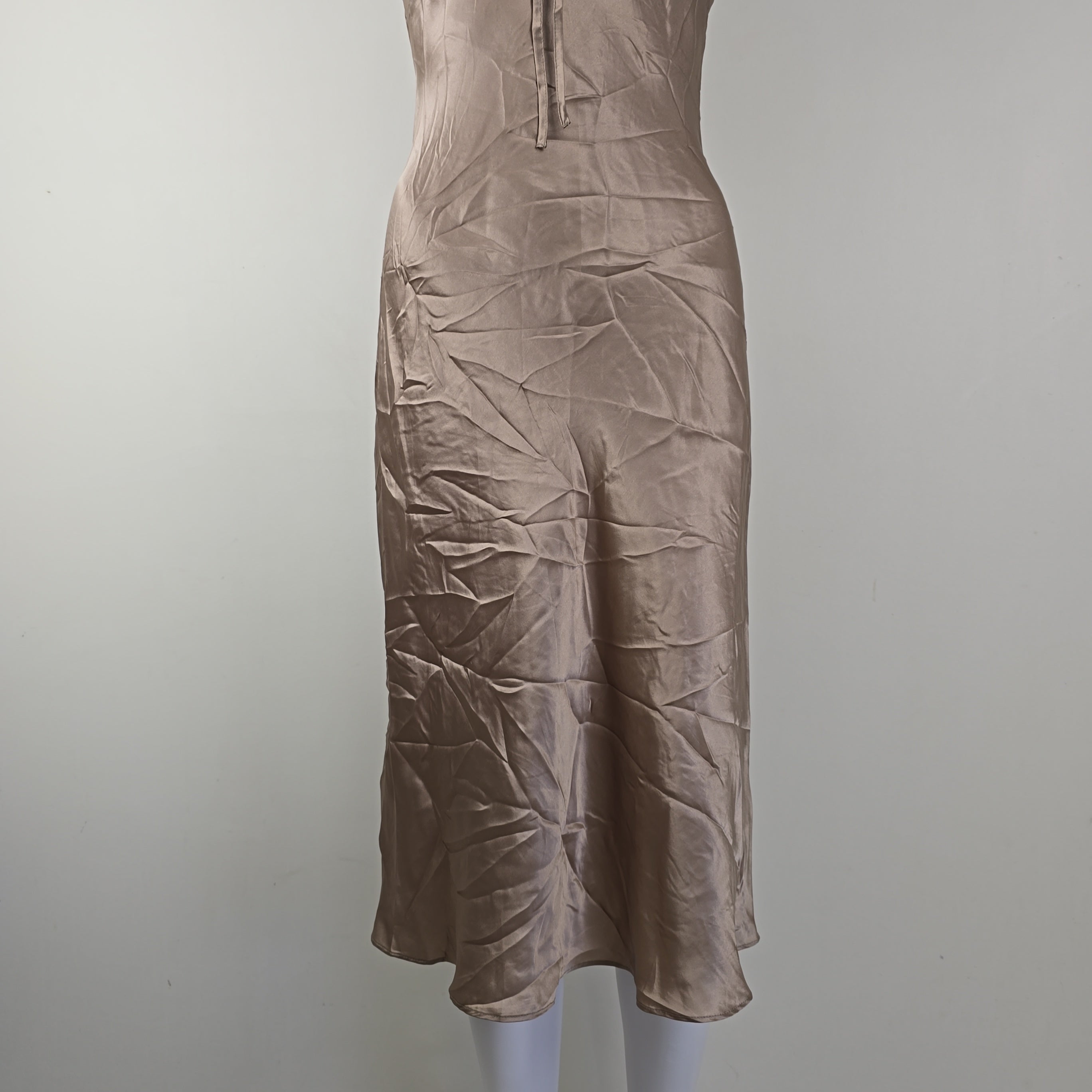 Beige dress on a light background