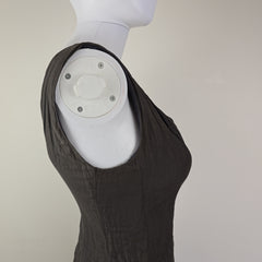 Black sleeve on a beige background