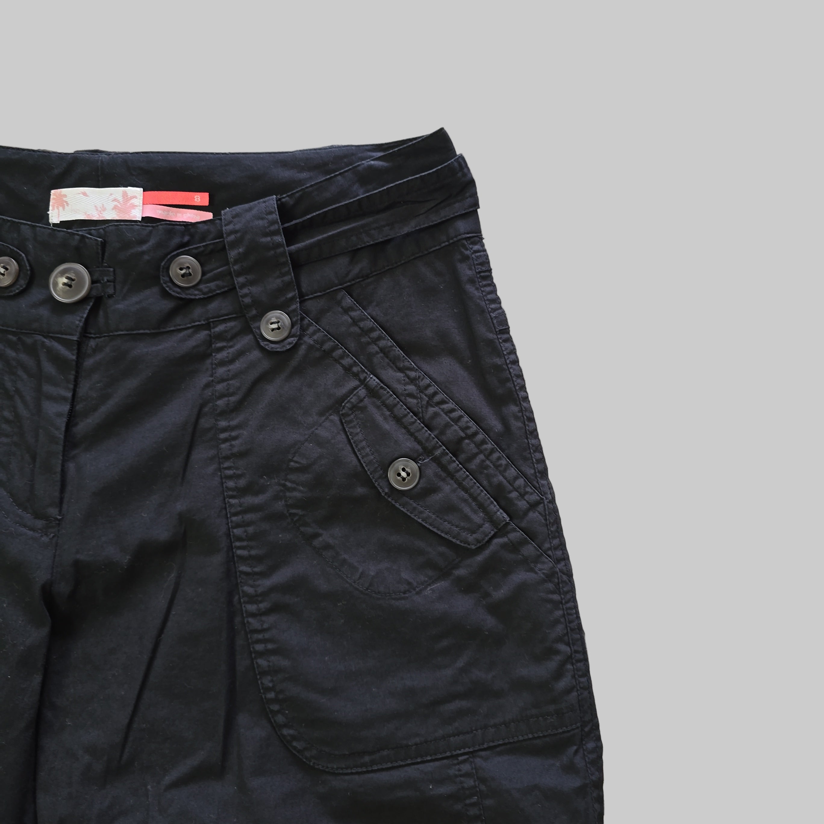 Pair of black pants on a light background