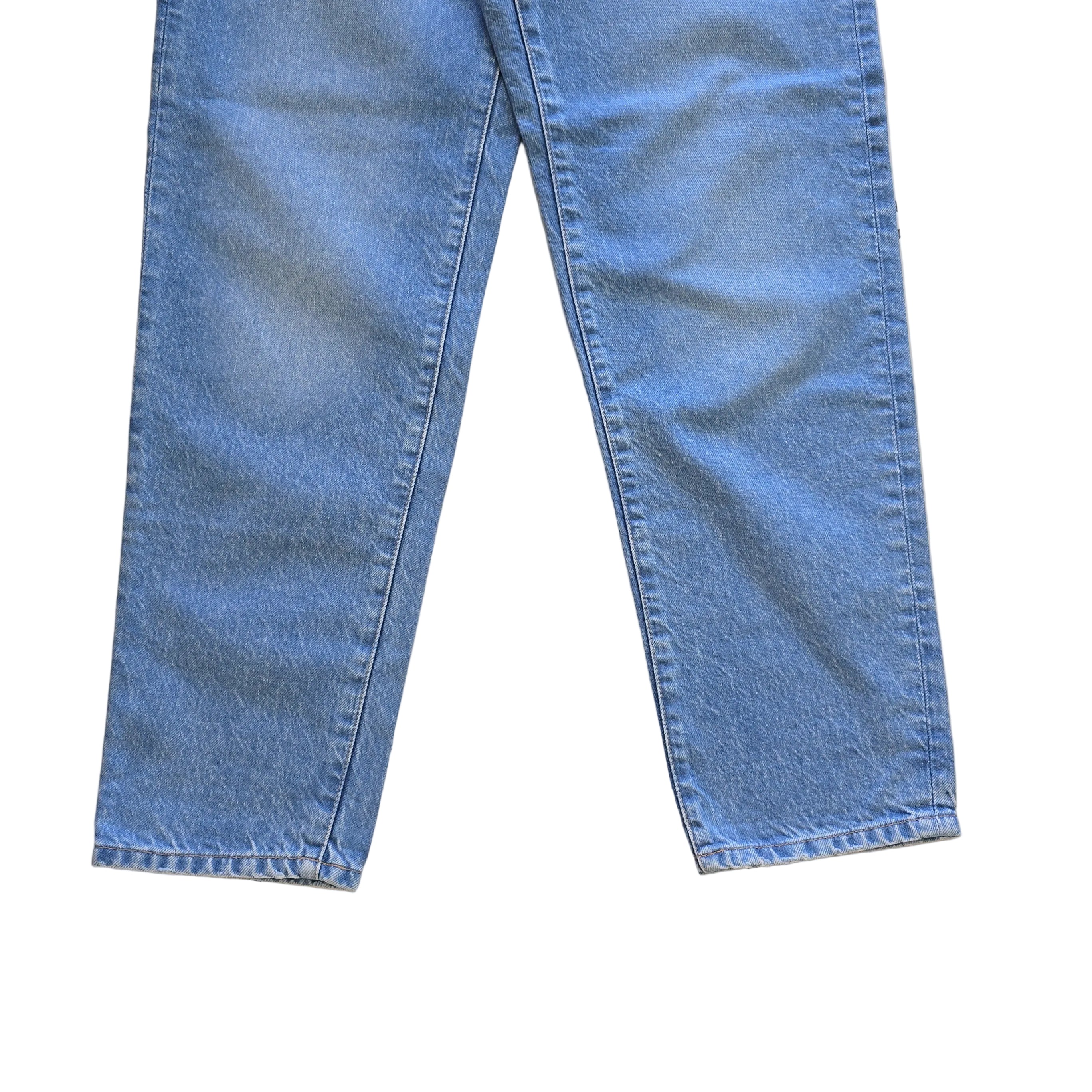 Pair of blue jeans on a light background