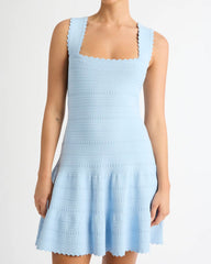 Light blue sleeveless dress on a white background