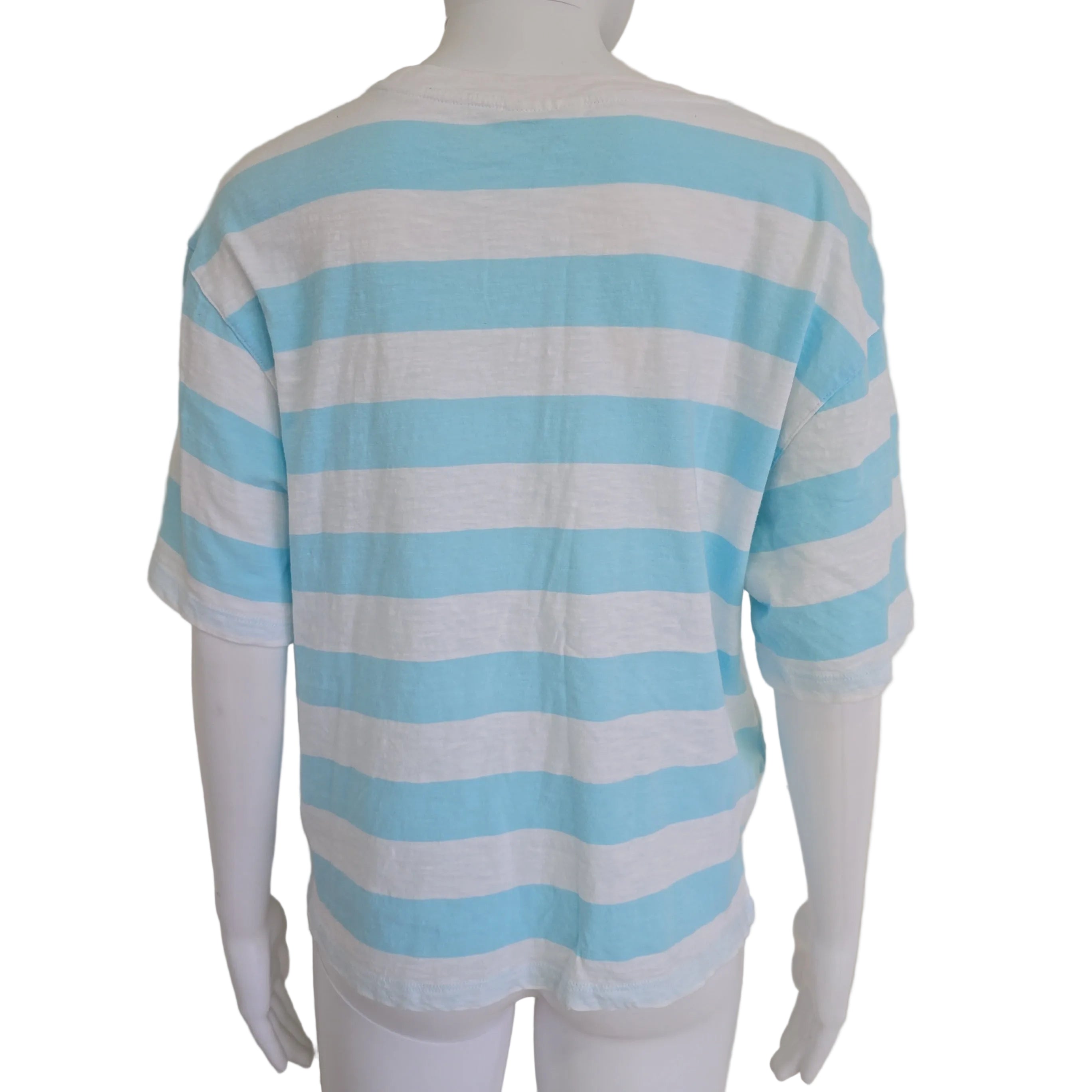 Mannequin wearing a blue and white striped garment on a plain background