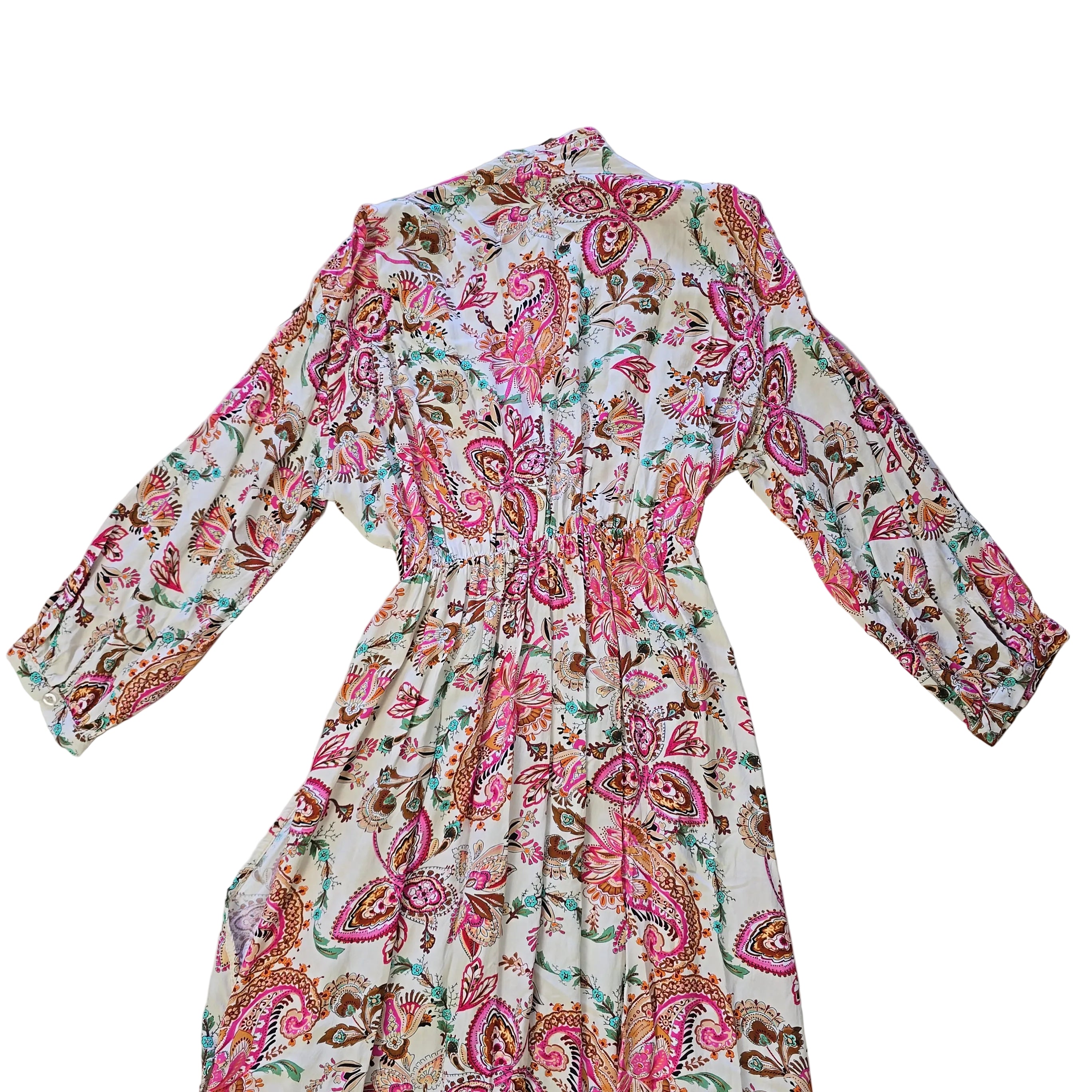 Floral patterned wrap style dress on a light background