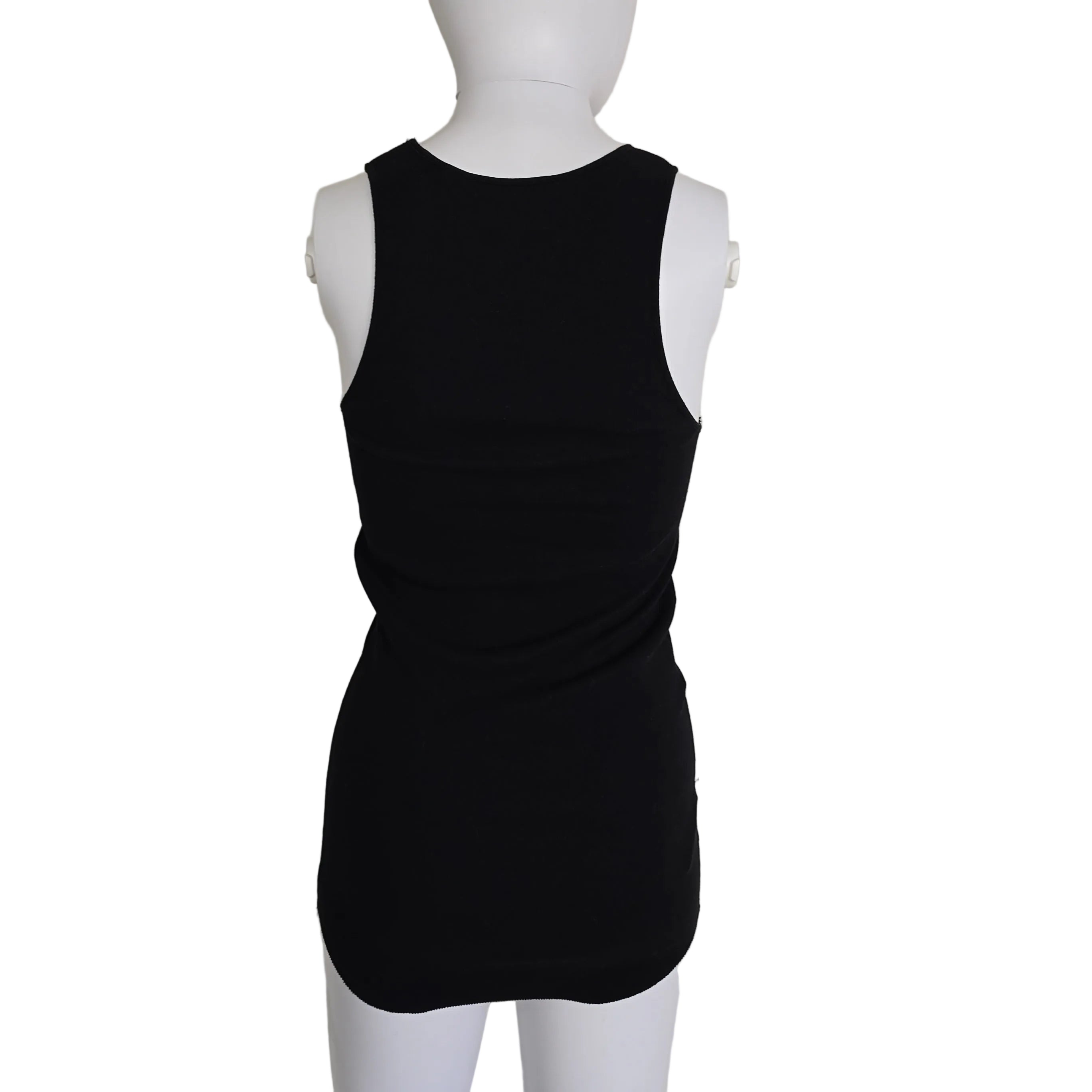Black sleeveless top on a mannequin against a beige background