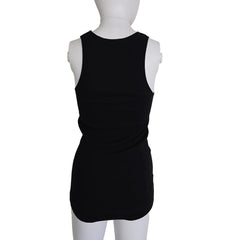 Black sleeveless top on a mannequin against a beige background