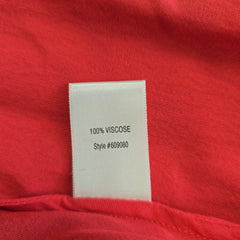 Label on a red fabric with '100% Viscose' text