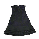 Black dress on a tiled floor