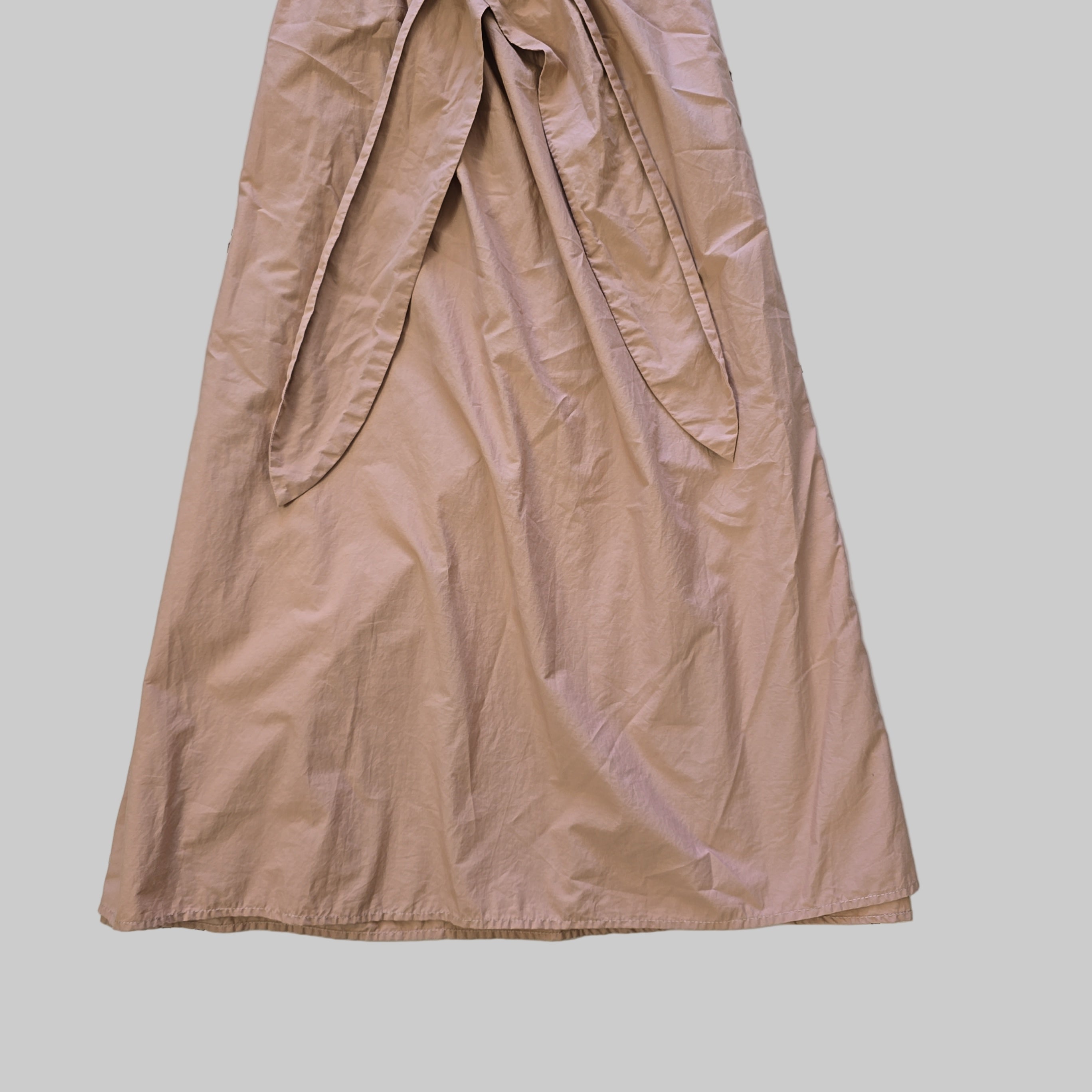 Brown skirt on a tiled floor