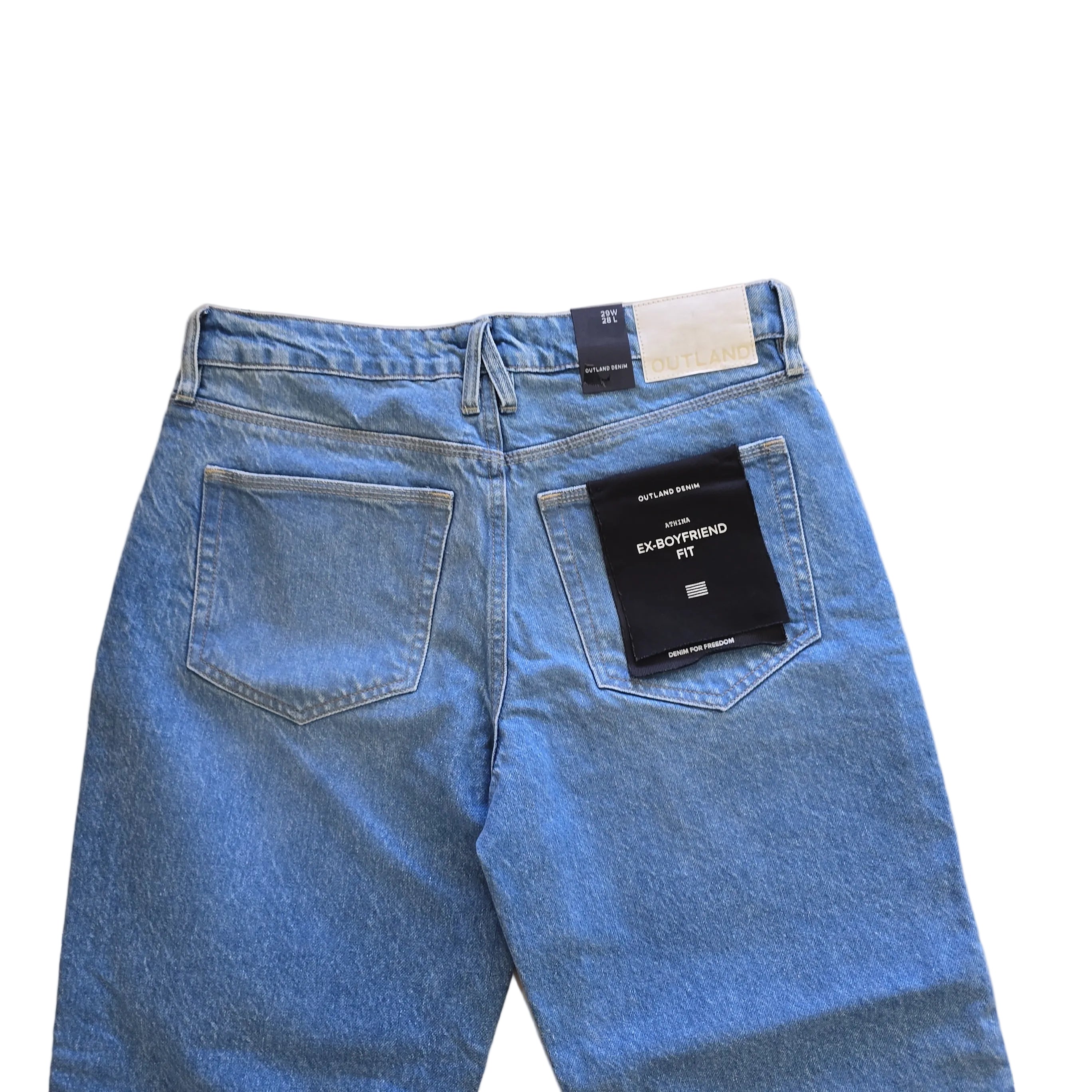 Pair of blue jeans on a light background