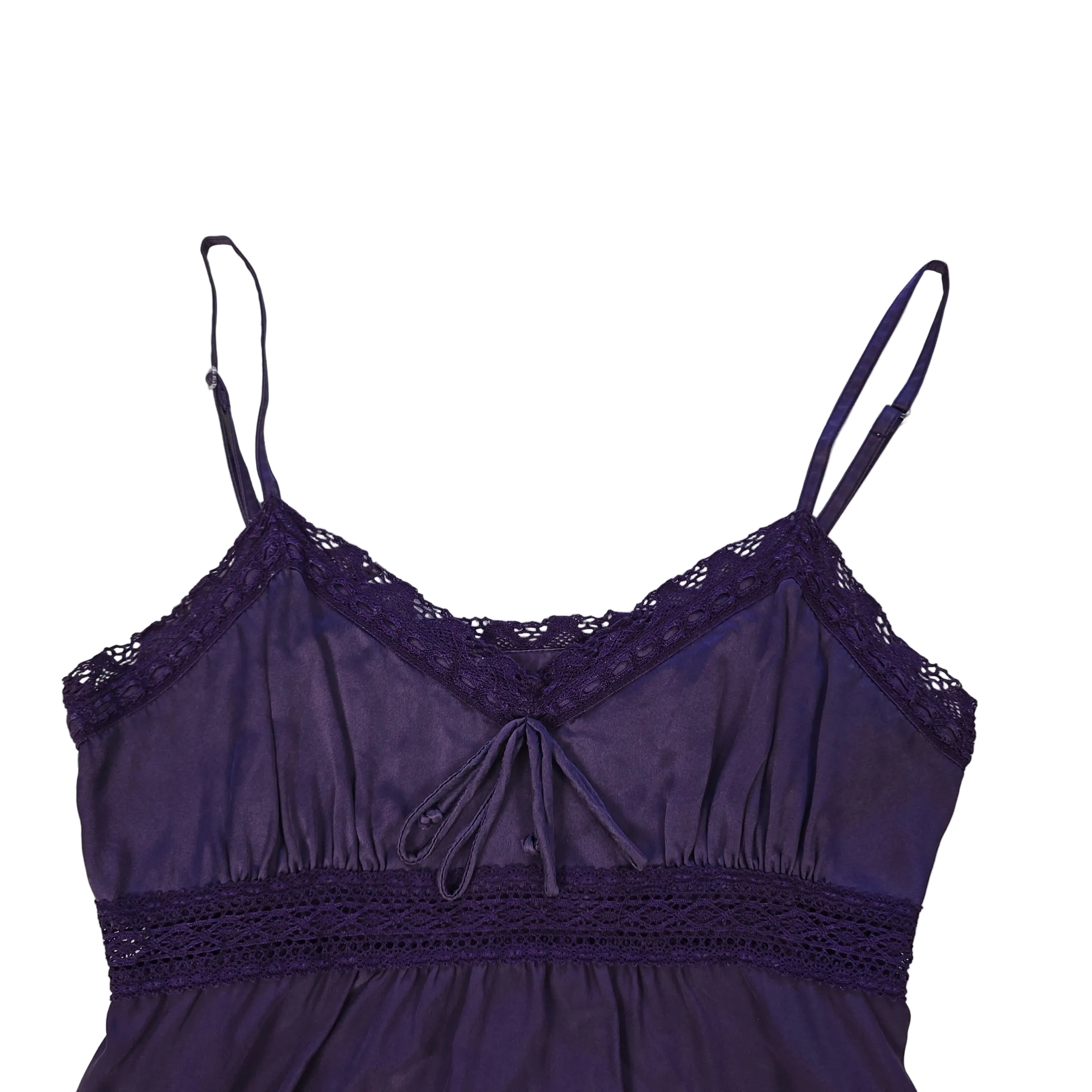 Purple lace-trimmed top on a light background
