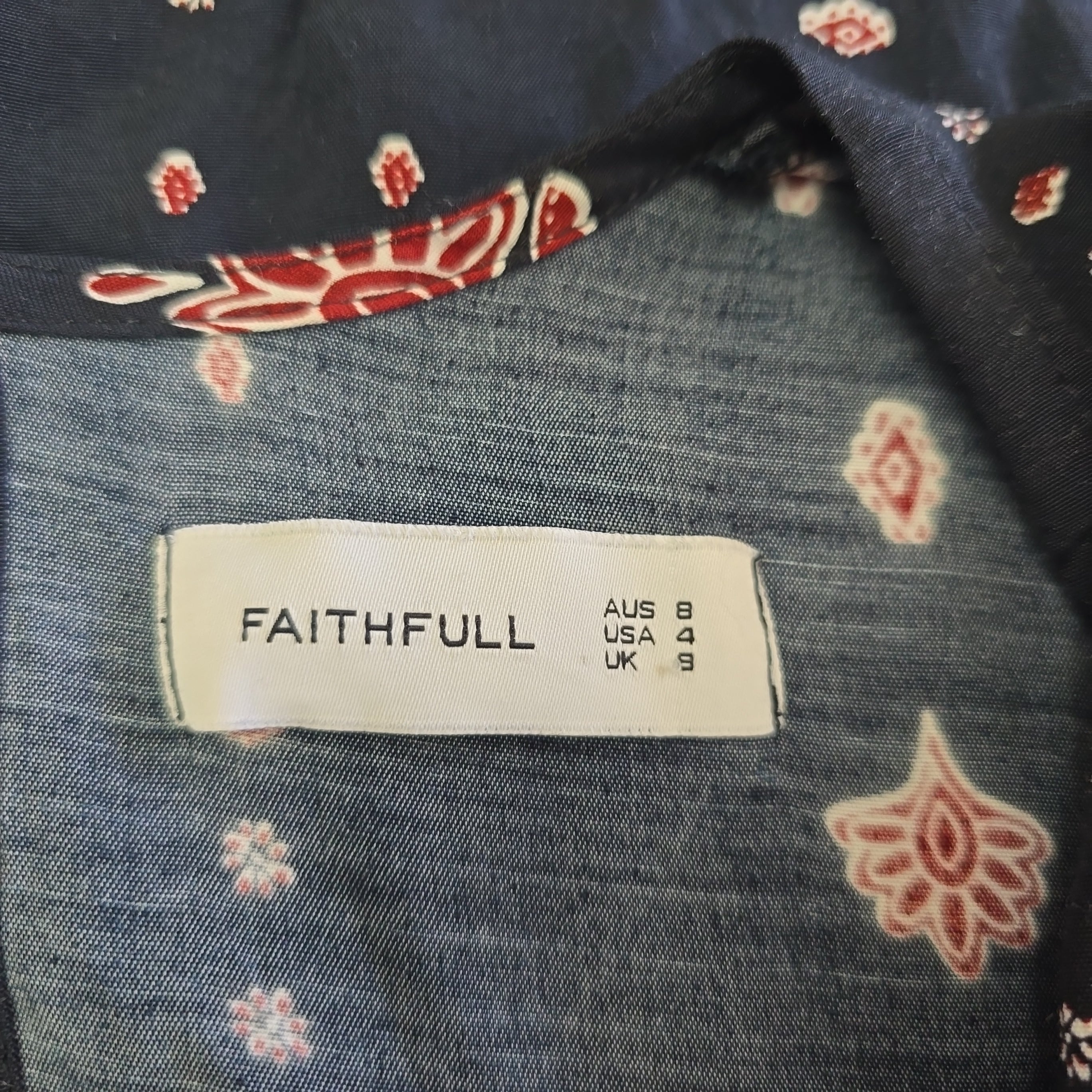 Clothing label on a garment with floral patterns