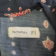 Clothing label on a garment with floral patterns