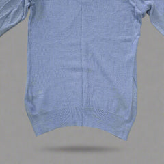 Blue fabric on a tiled floor