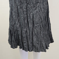 Crumpled black skirt on a white background