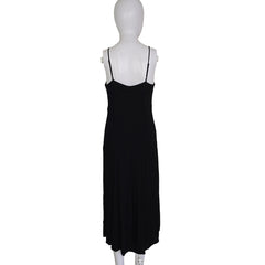 Black dress on a mannequin against a plain background