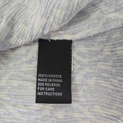 Fabric label on a textured fabric background