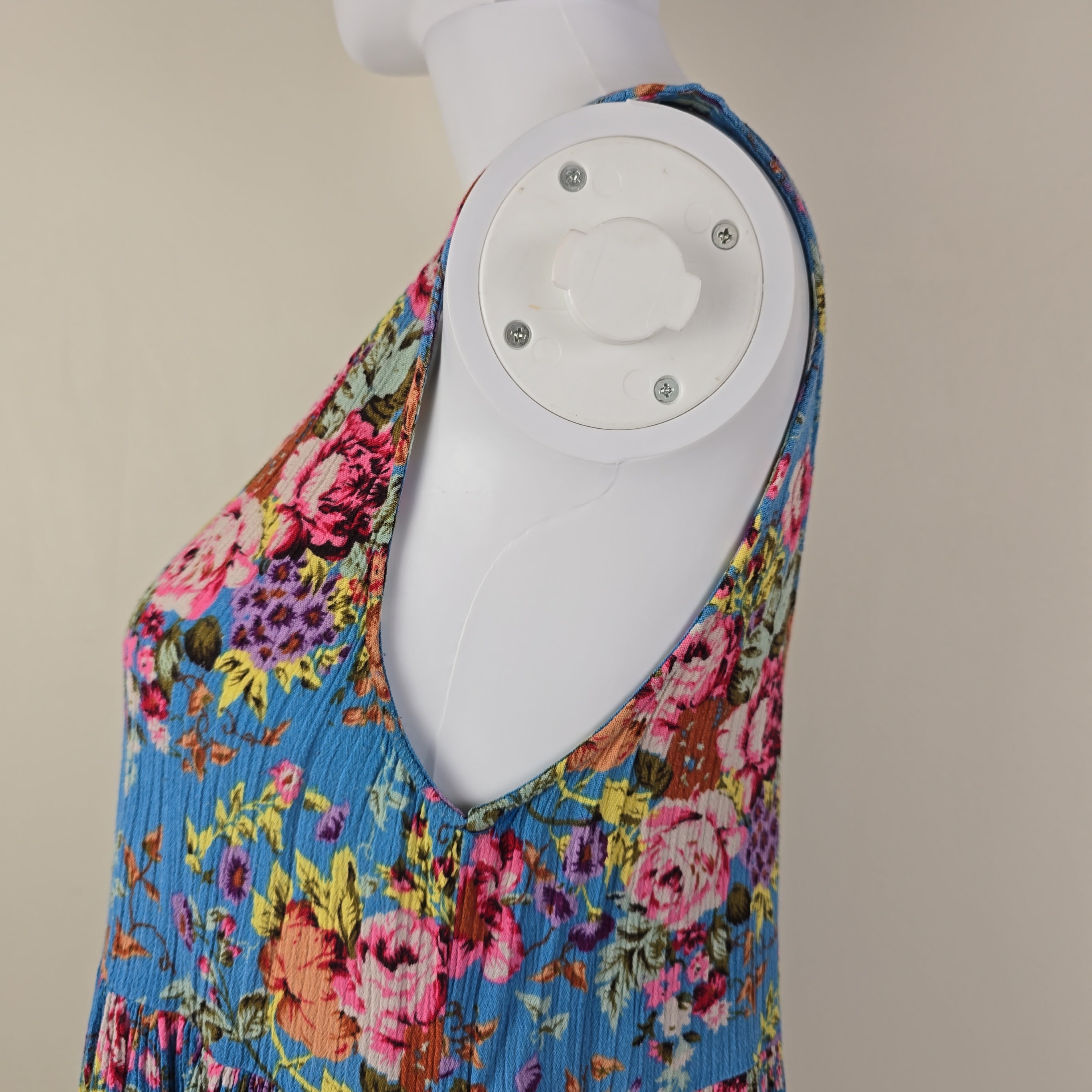 Blue floral top with on a light background