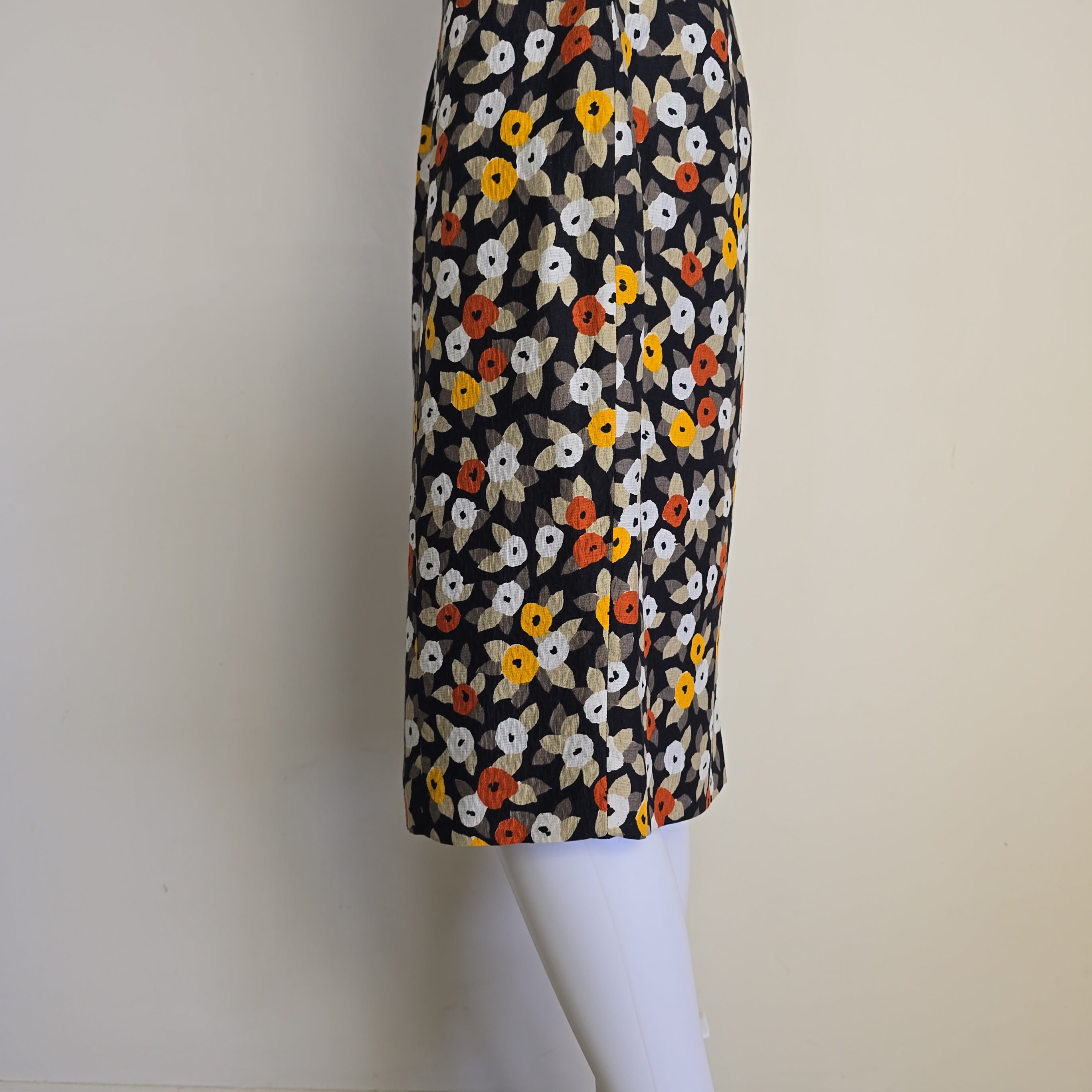 Floral-patterned strapless dress on a light background