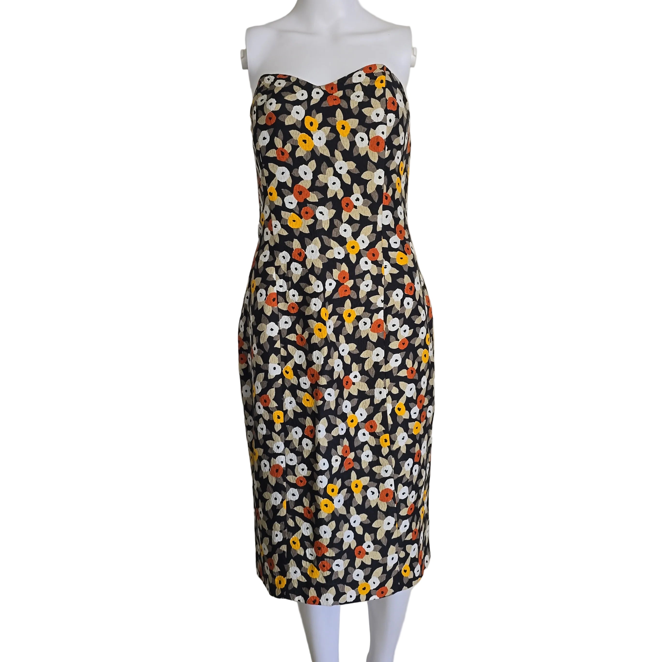 Floral-patterned strapless dress on a light background