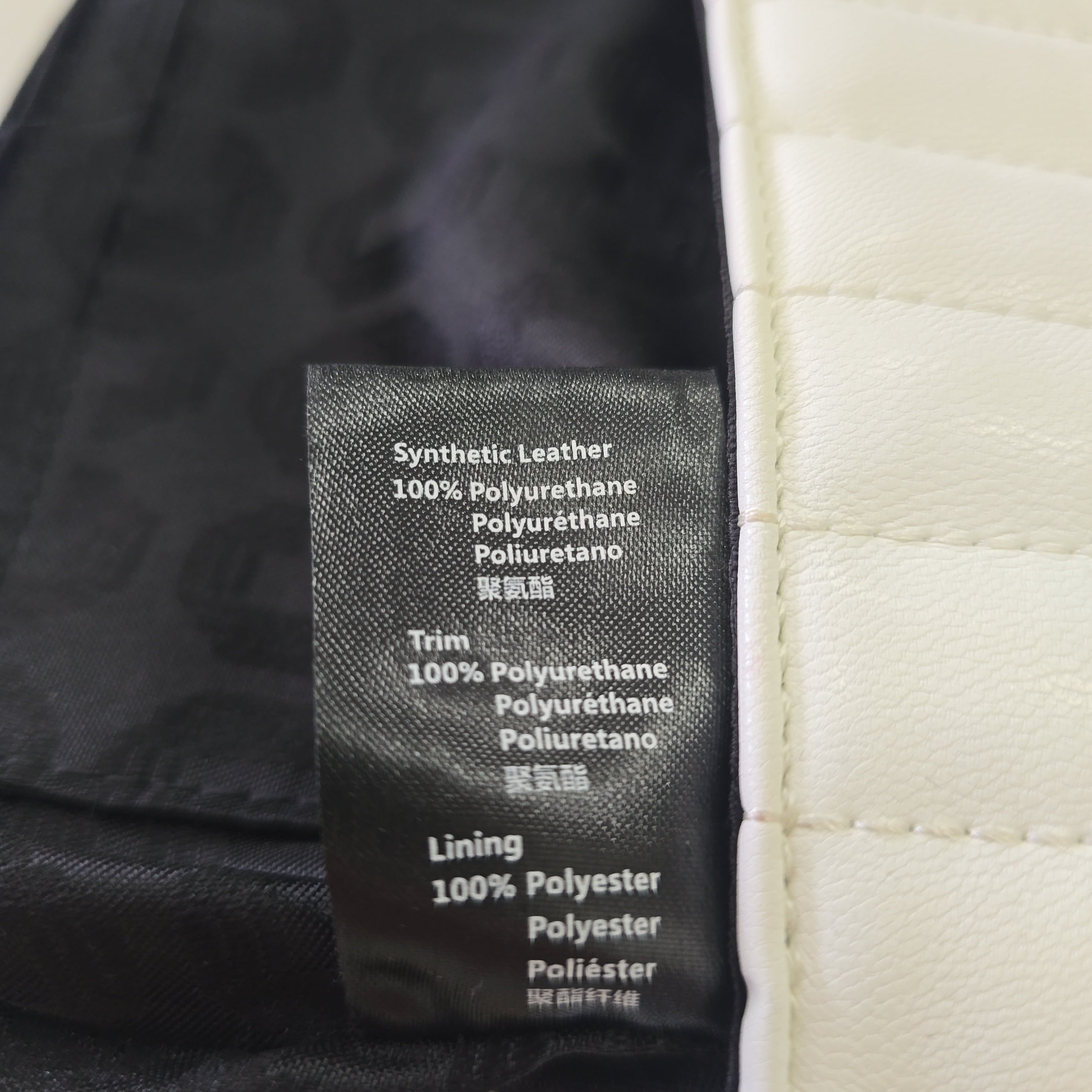 Textile label on a product with material information.