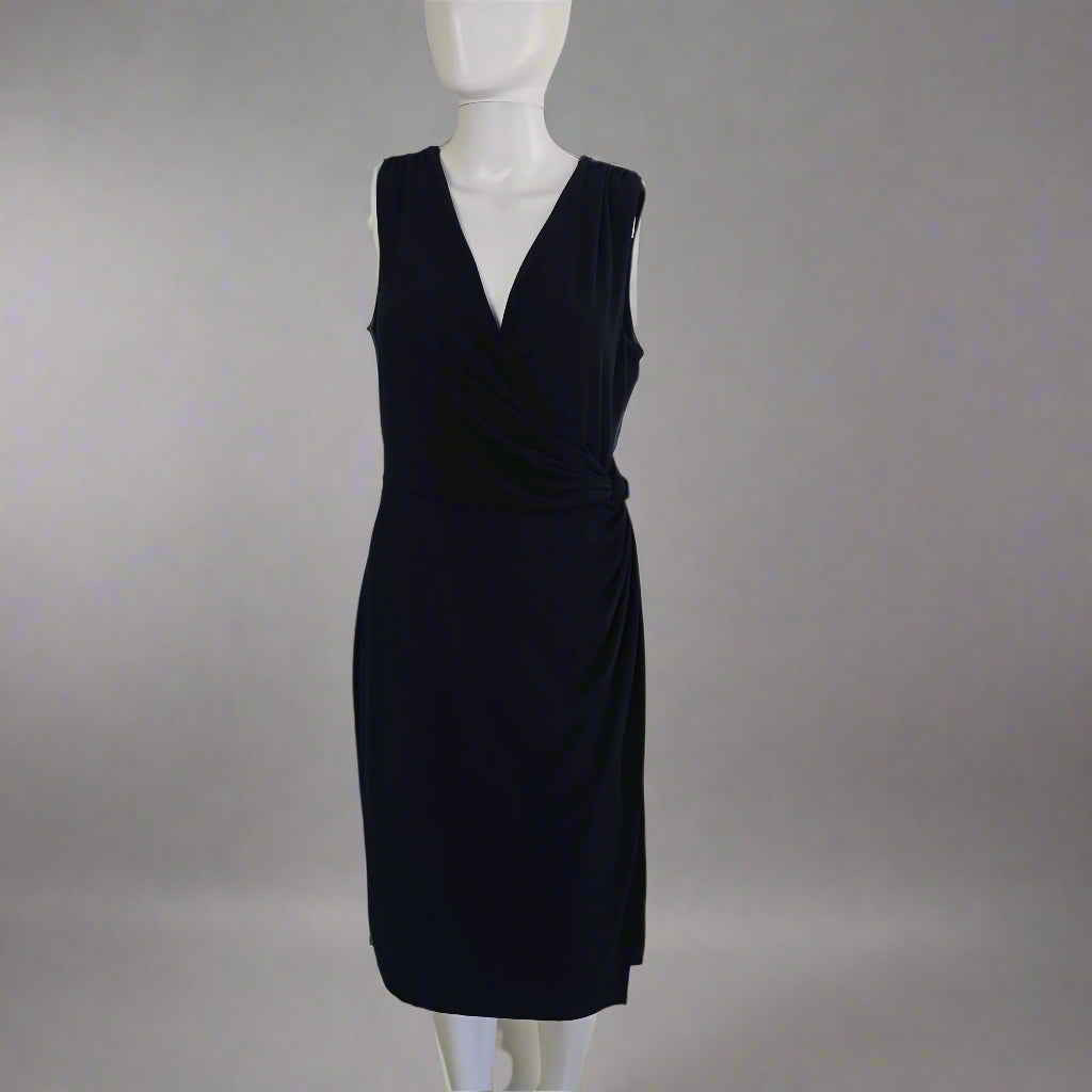 Navy blue dress on a light gray background