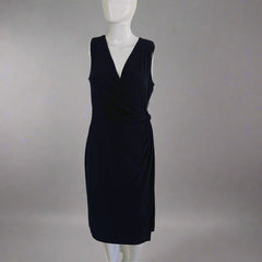 Navy blue dress on a light gray background