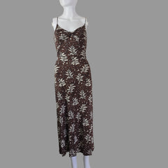 Brown dress with leaf pattern on a white background