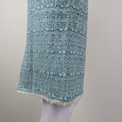 Textured blue skirt on a light gray background