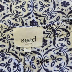 Patterned fabric with a visible 'seed Heritage' label