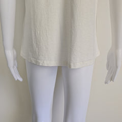 Mannequin wearing a beige skirt on a plain background