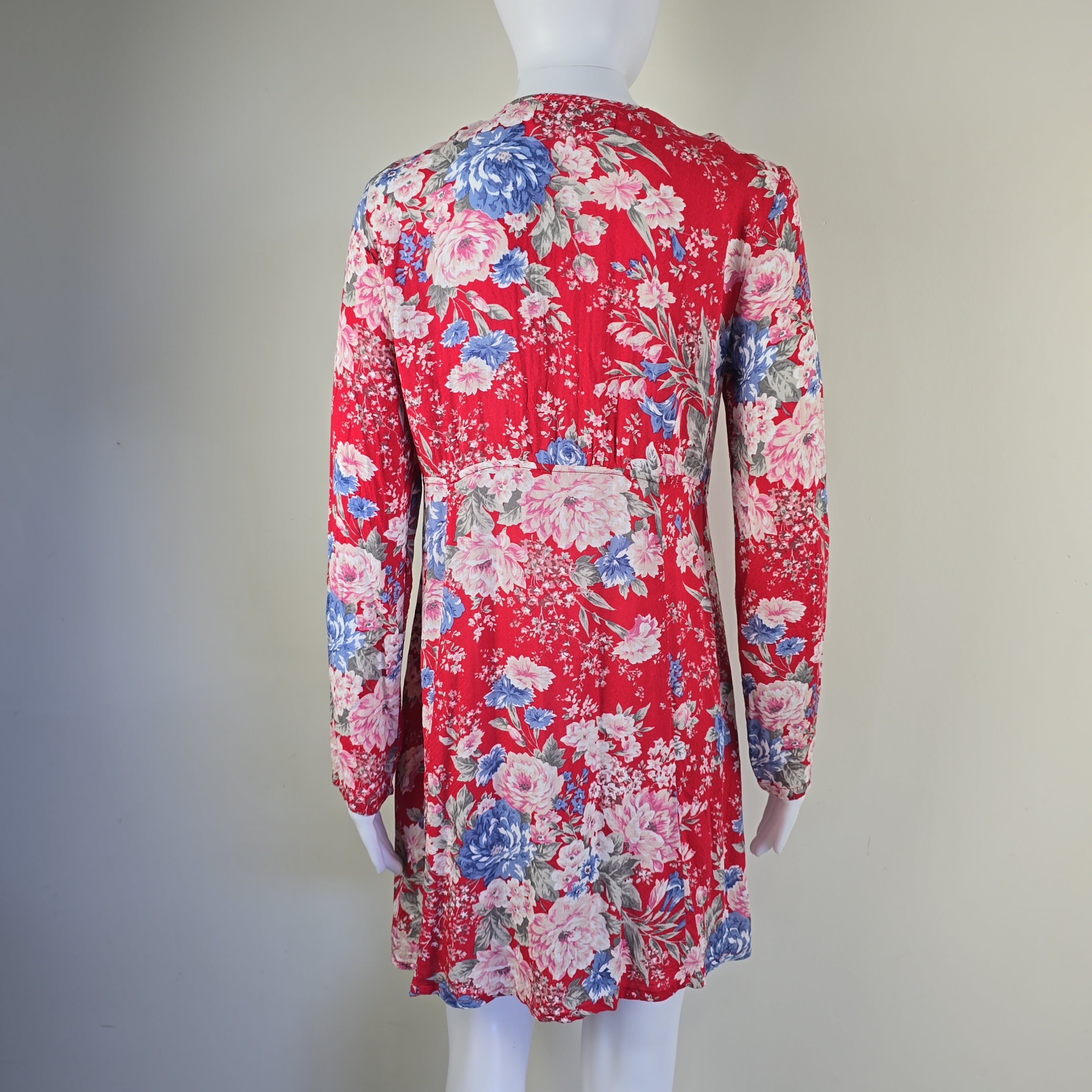 Red floral dress on a light background