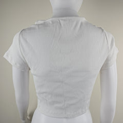 White top on a beige background