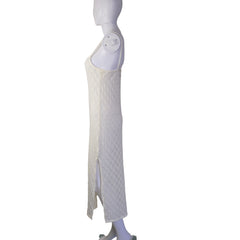 White textured dress on a light background.