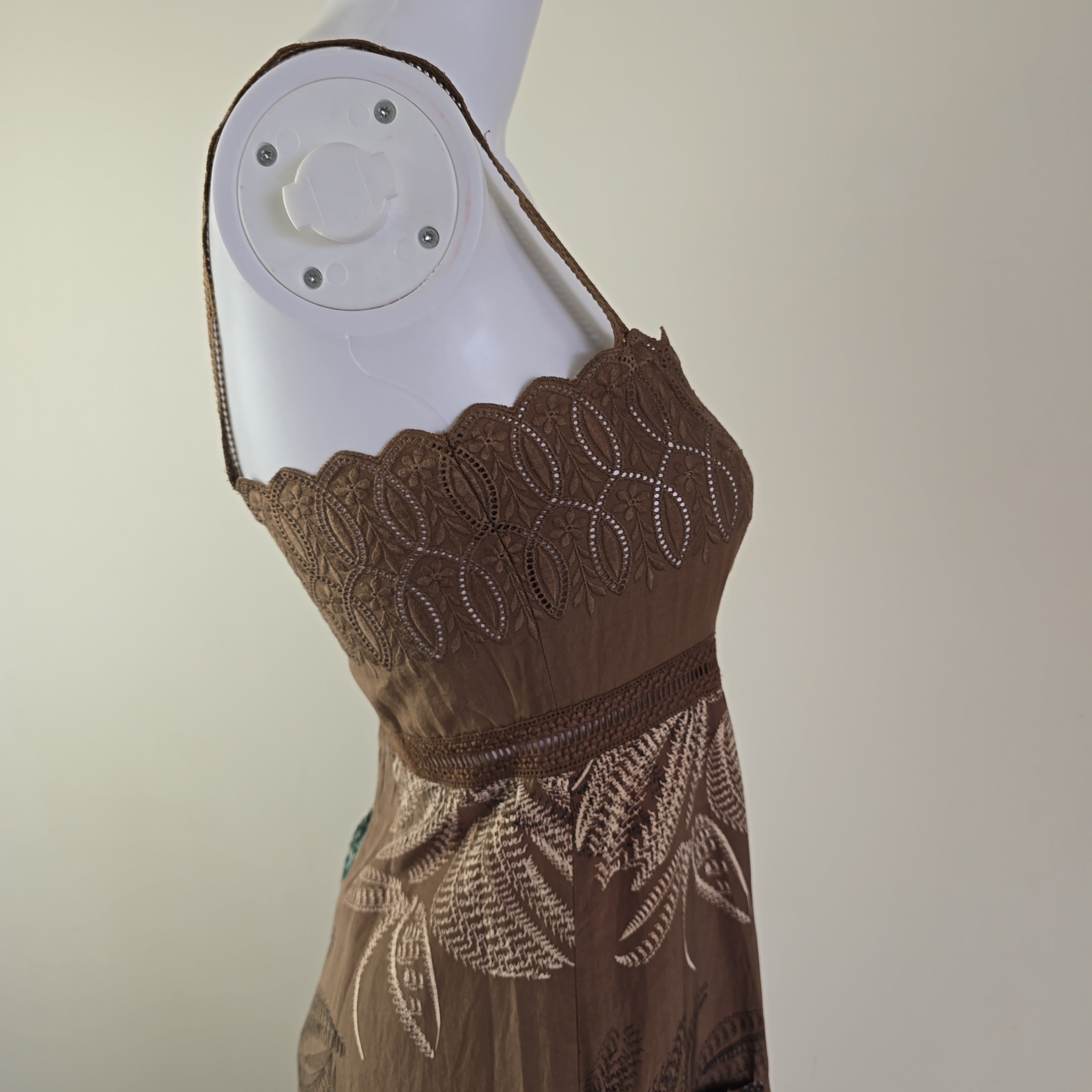 Brown lace trim on a white background