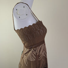 Brown lace trim on a white background