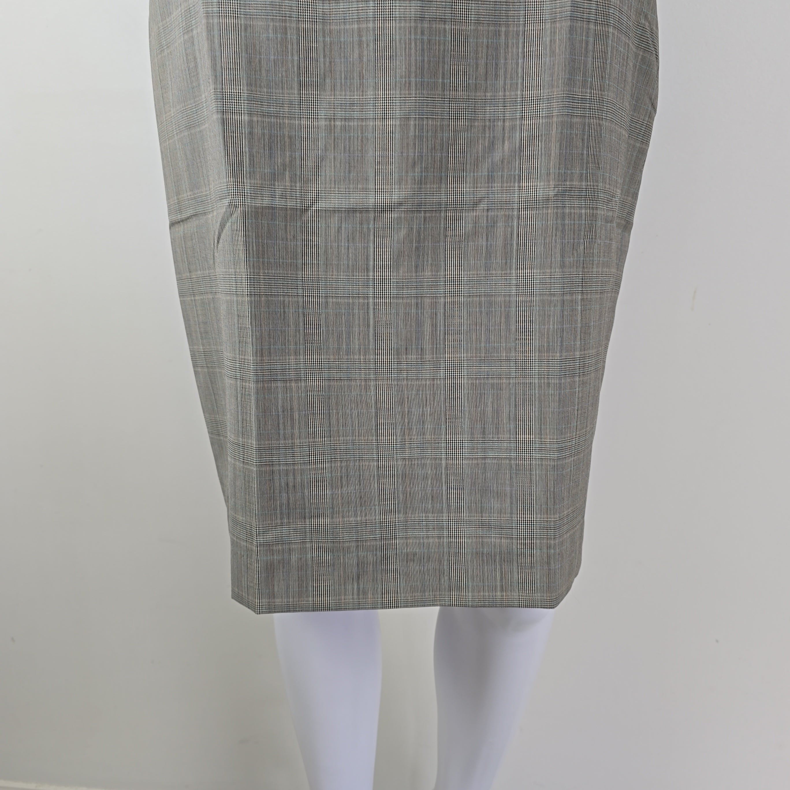 Gray checkered skirt on a white background