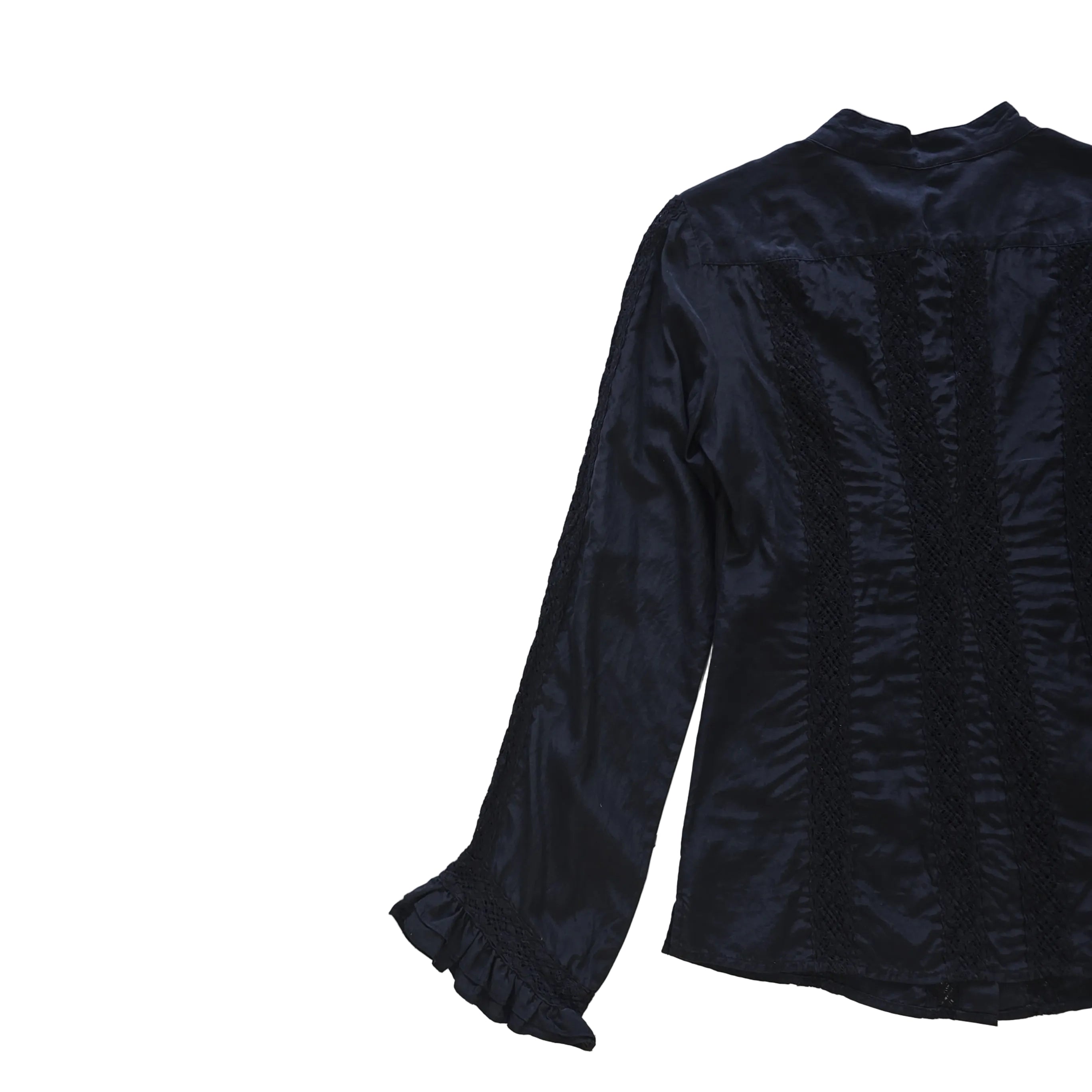 Black long sleeved button up top with black lace details on a light background