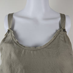 Grey tank top on a mannequin with a plain background
