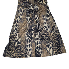 Leopard print dress on a light background