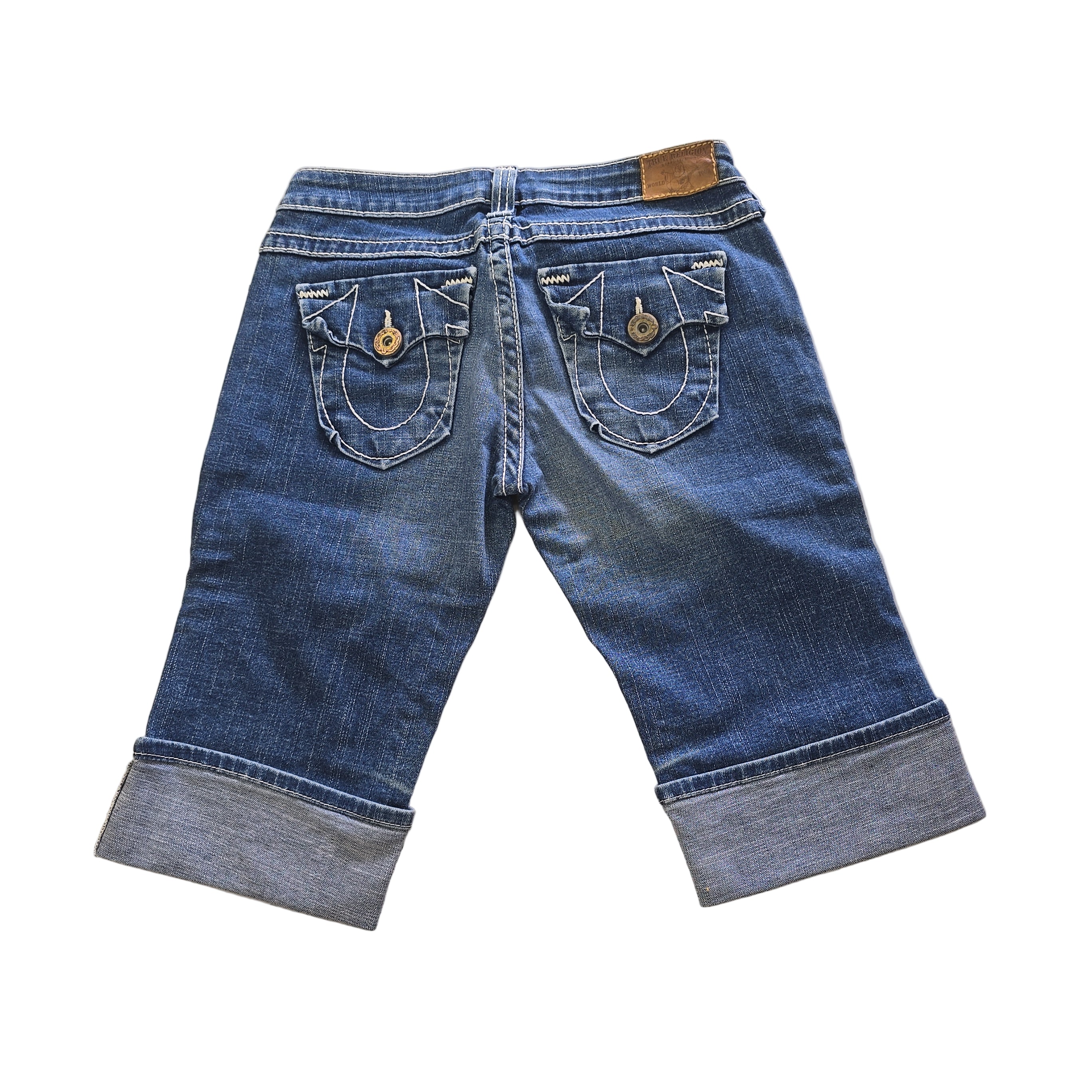 Pair of blue jean shorts on a light background