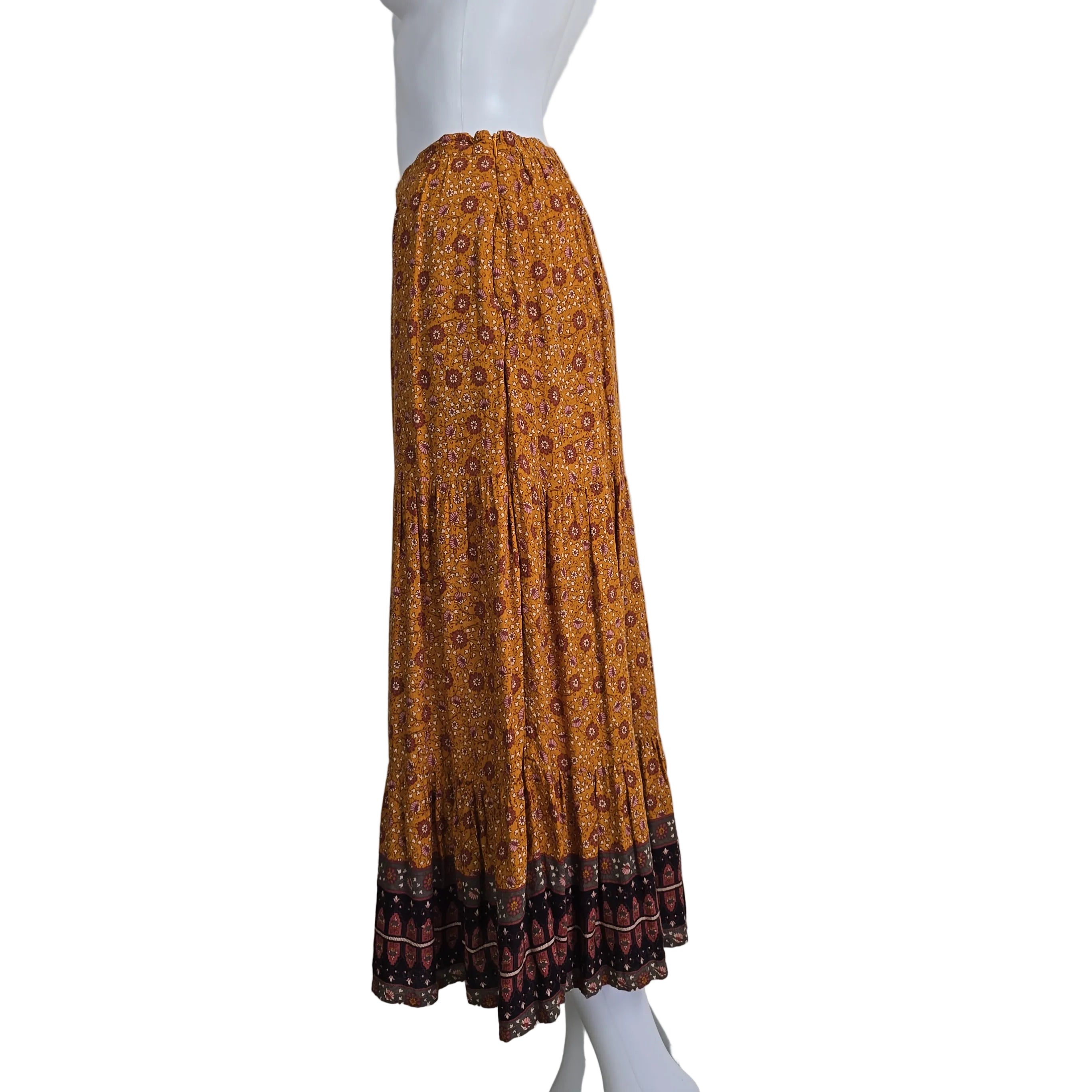 Brown fabric on a mannequin against a white background