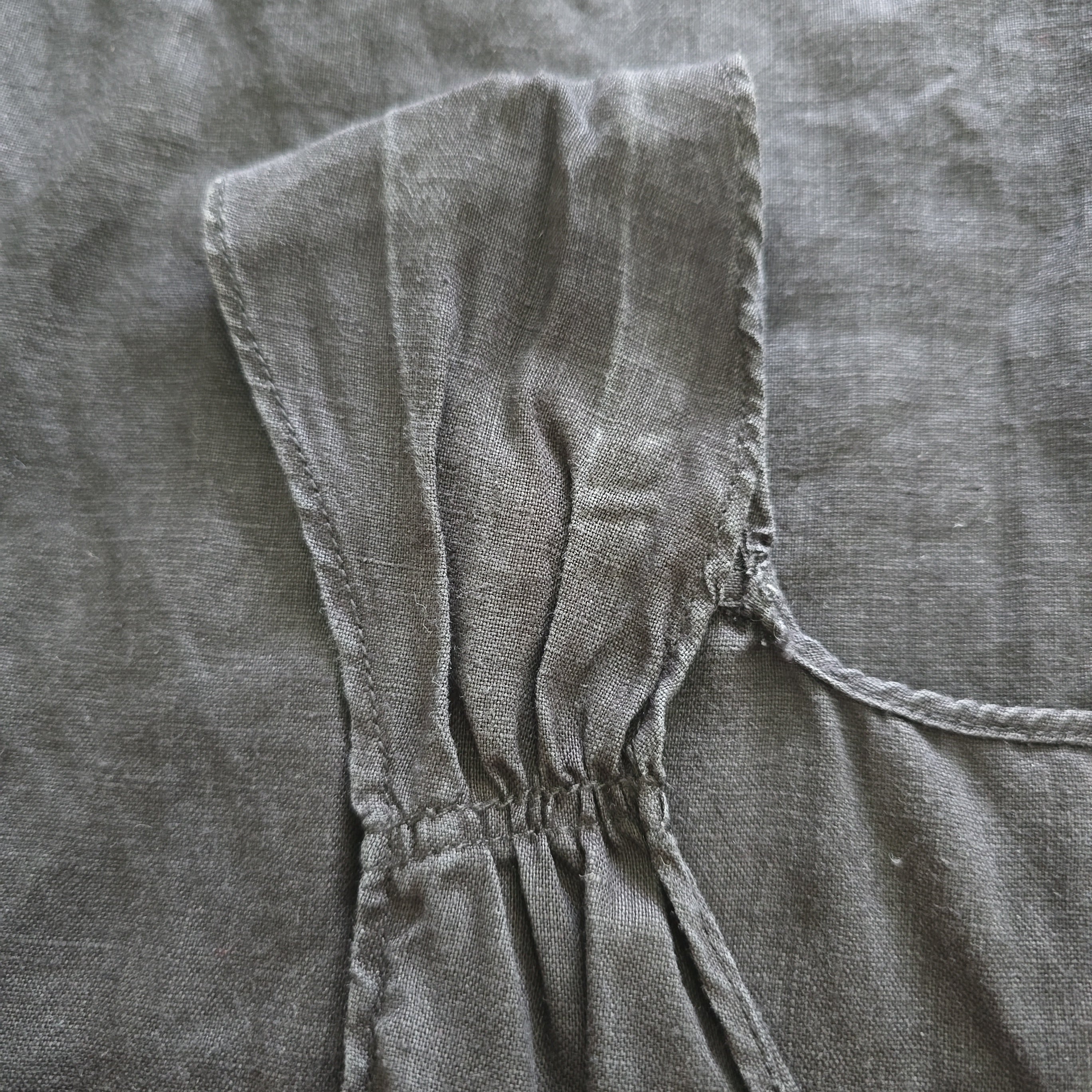 Close-up of a gray fabric with a textured surface