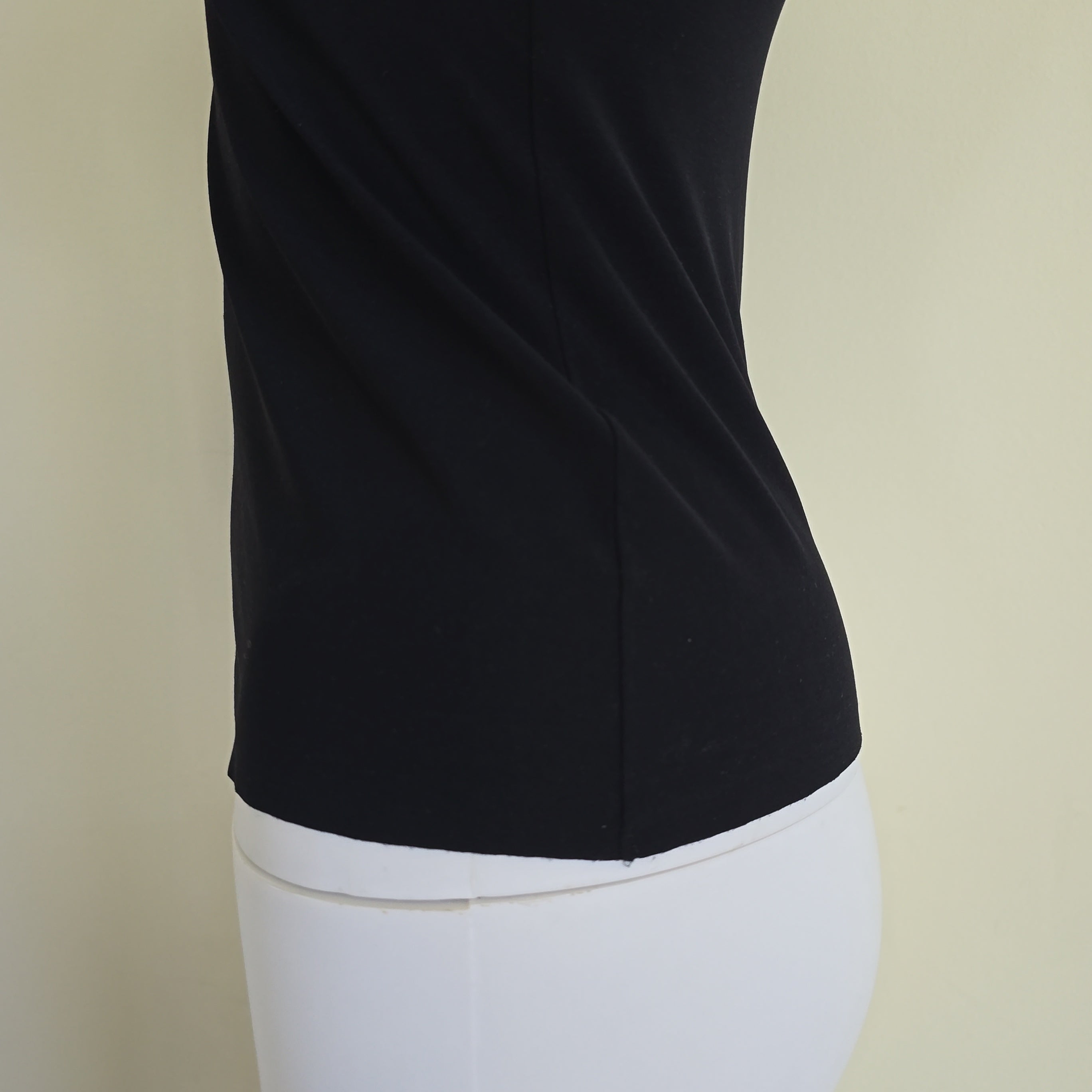 Black tank top on a light background