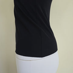 Black tank top on a light background