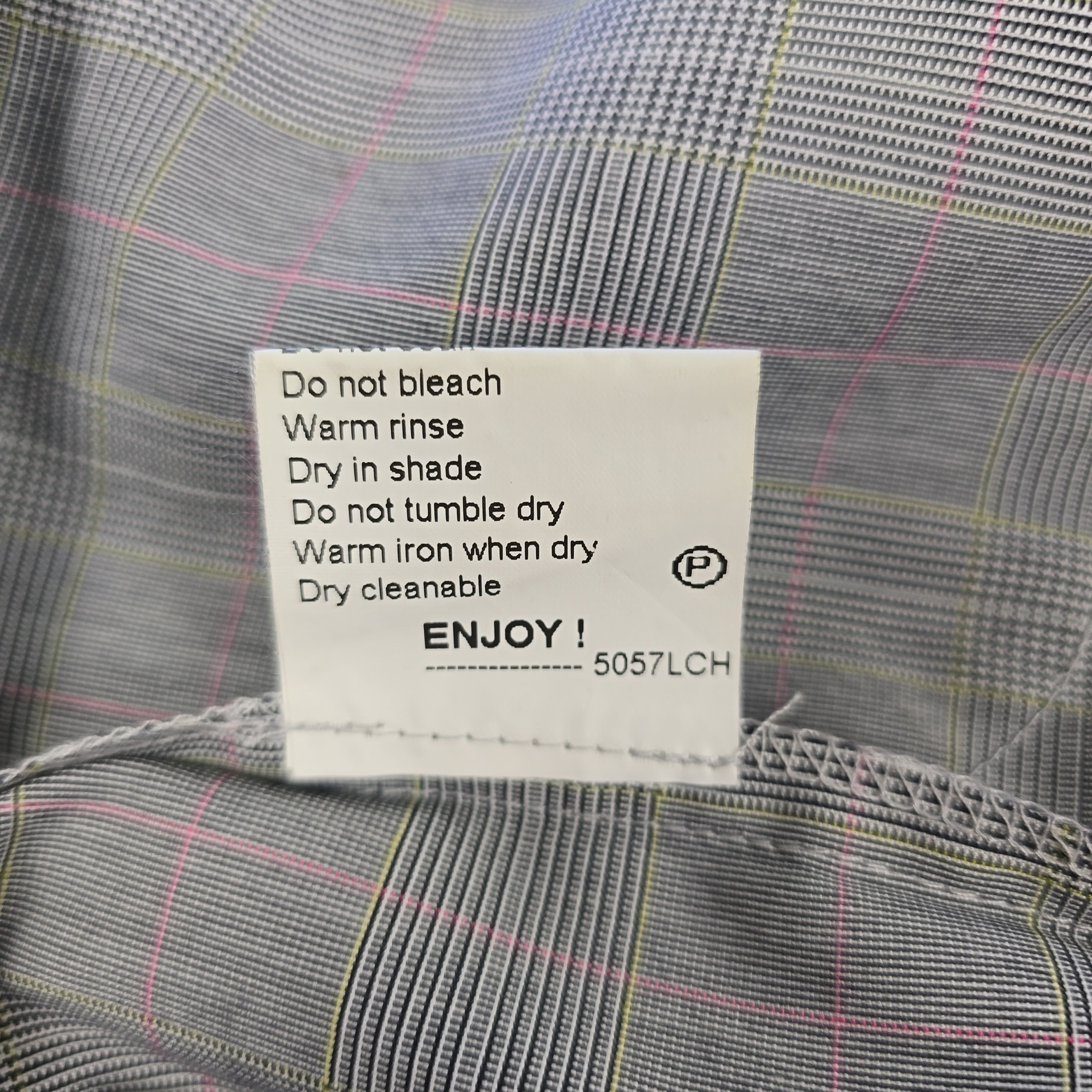 Fabric with a care label on a checkered background